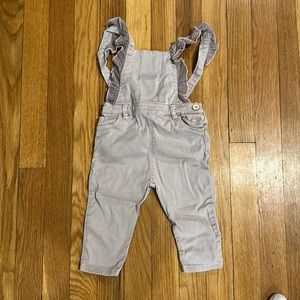 Zara mauve colored ruffle overalls.